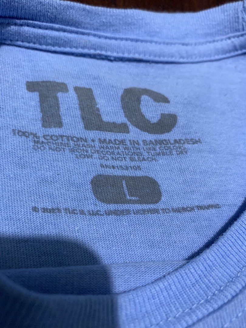 TLC 1992 Graphic Tee Light Blue Size L (Category: Tshirts & Polo Shirts ) located in Malabon City. Submitted by solerevolutionph (Listing ID 1470548751, Image 3). Description: - Design: TLC 1992 group member graphic tee - Color: Light blue - Size: L (Pit to pit: 18 inches, Length: 28 inches) - Material: 100% cotton - Origin: Made in Bangladesh - Style: Vintage band merch 18.5 x 28 9/10 DM me for sure buyer. ✅GCash/Maya/BDO/GoTyme for payment. ✅Sh