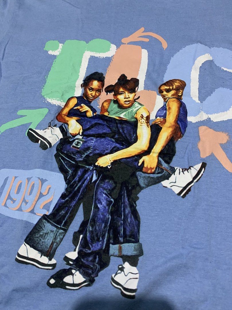 TLC 1992 Graphic Tee Light Blue Size L (Category: Tshirts & Polo Shirts ) located in Malabon City. Submitted by solerevolutionph (Listing ID 1470548751, Image 2). Description: - Design: TLC 1992 group member graphic tee - Color: Light blue - Size: L (Pit to pit: 18 inches, Length: 28 inches) - Material: 100% cotton - Origin: Made in Bangladesh - Style: Vintage band merch 18.5 x 28 9/10 DM me for sure buyer. ✅GCash/Maya/BDO/GoTyme for payment. ✅Sh