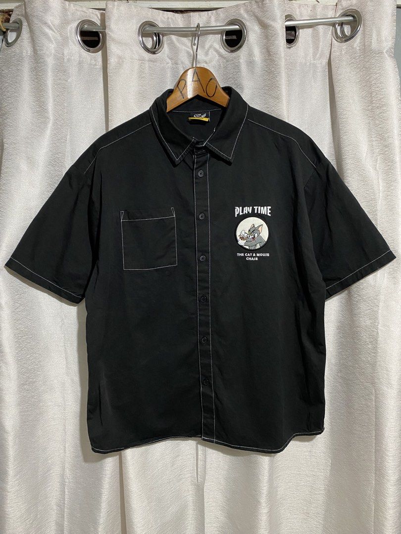 Tom and Jerry Button Down shirt (Category: Tshirts & Polo Shirts ) located in Davao. Submitted by VapenDrip (Listing ID 1470465125, Image 1). Description: Tom and Jerry Button Down shirt Medium oversized 28x23.5 Very good condition Need wash 280+sf.