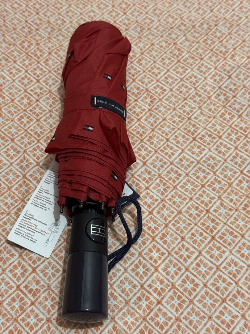 Tommy Hilfiger Automatic Umbrella (Category: Announcements) located in Quezon City. Submitted by branded_jo (Listing ID 1470455702, Image 1). Description: Original Tommy Hilfiger Automatic Umbrella Color Red Brand new Bought in Canada Lalomove Ready.