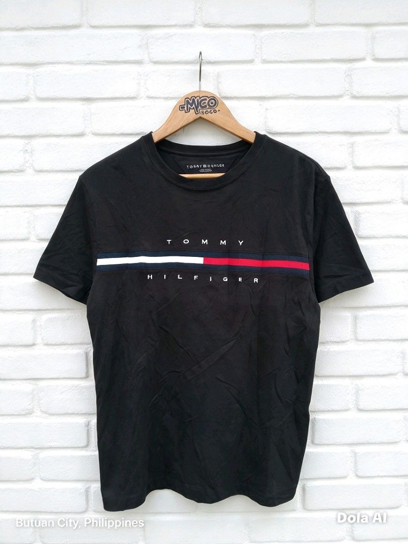 Tommy Hilfiger Black T-Shirt Medium (Category: Tshirts & Polo Shirts ) located in Bislig. Submitted by micoy22 (Listing ID 1470392472, Image 1). Description: FOR SALE #PtpAdminTHANKYOU 490 SHIPPED TOMMY HILFIGER EMBROIDERY LOGO TEE SIZE MEDIUM ON TAG WAISTLINE 20 LENGTH 28 COLOR RATE 9.9/10 COLORAWY DUE TO THE LIGHT EFFECTS EXCELLENT CONDITION UNLI VOUCH BISLIG CITY SDS .