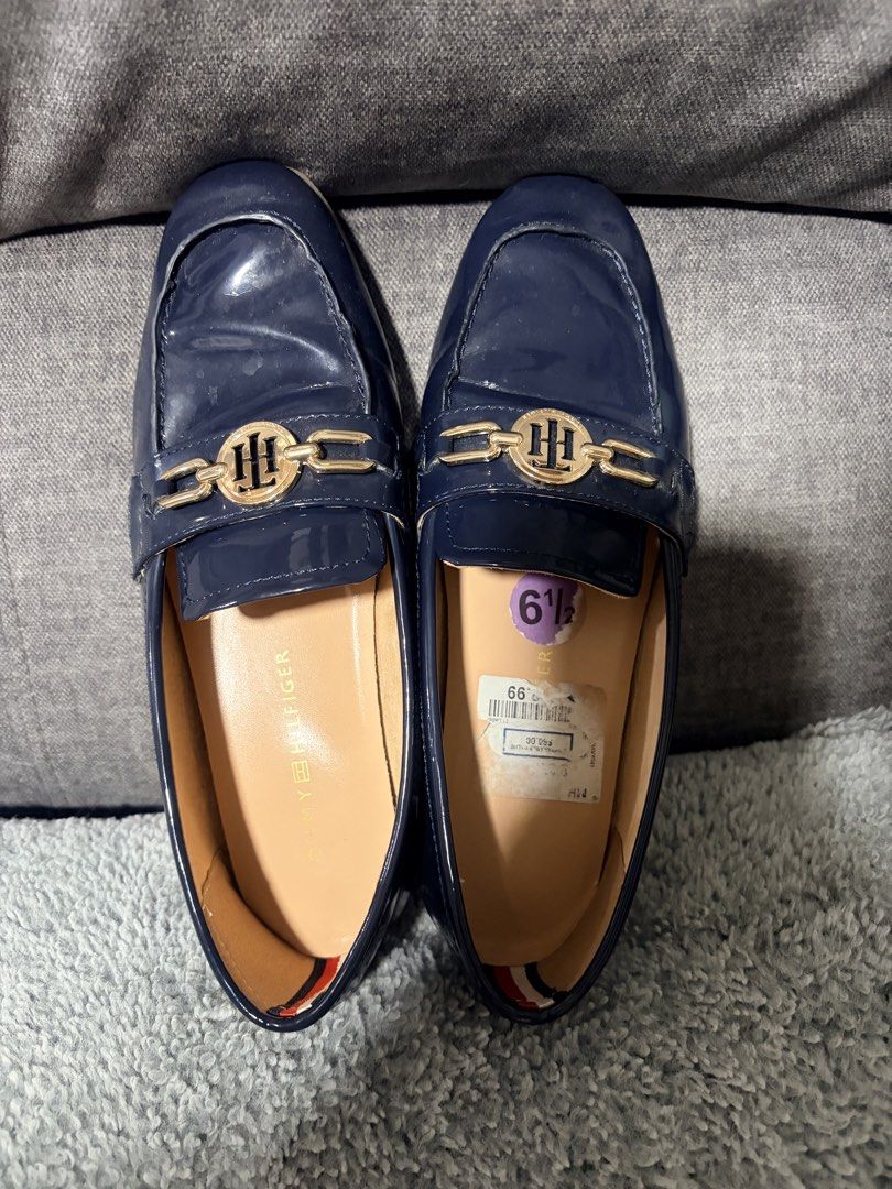 Tommy Hilfiger Loafers (Category: Loafers) located in Manila. Submitted by louisena28 (Listing ID 1470555285, Image 3). Description: FOR SALE! 👞✨ TOMMY HILFIGER LOAFERS 💙 Classic Navy Blue ✨ Gold-tone logo hardware 📏 Size: US 6½ 👞 Elegant and stylish design — perfect for casual or semi-formal outfits! 📌 Condition: Pre-loved; please see photos for actual condition and signs of use. 💰 Price: ₱1100 📍 Location: Manila 📩 Message me for inquiri