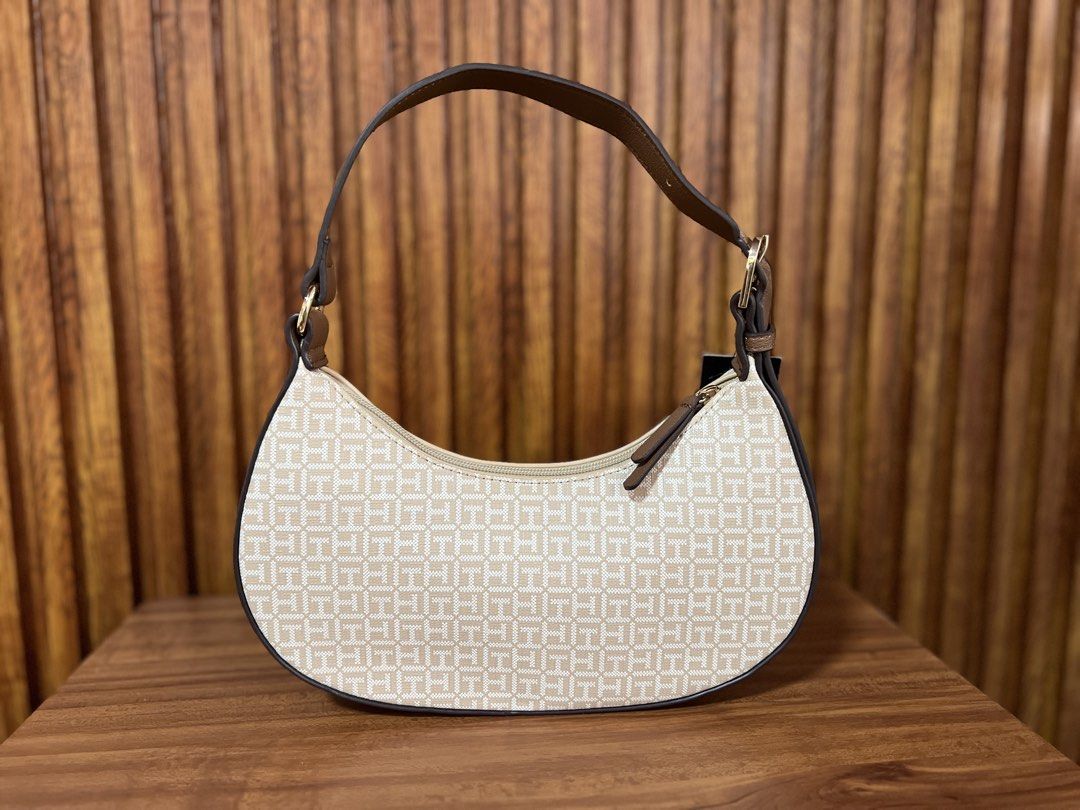 Tommy Hilfiger moon bag (Category: Shoulder Bags) located in Cabanatuan. Submitted by hellorhea (Listing ID 1470434832, Image 3). Description: Brand new fresh from the US. .