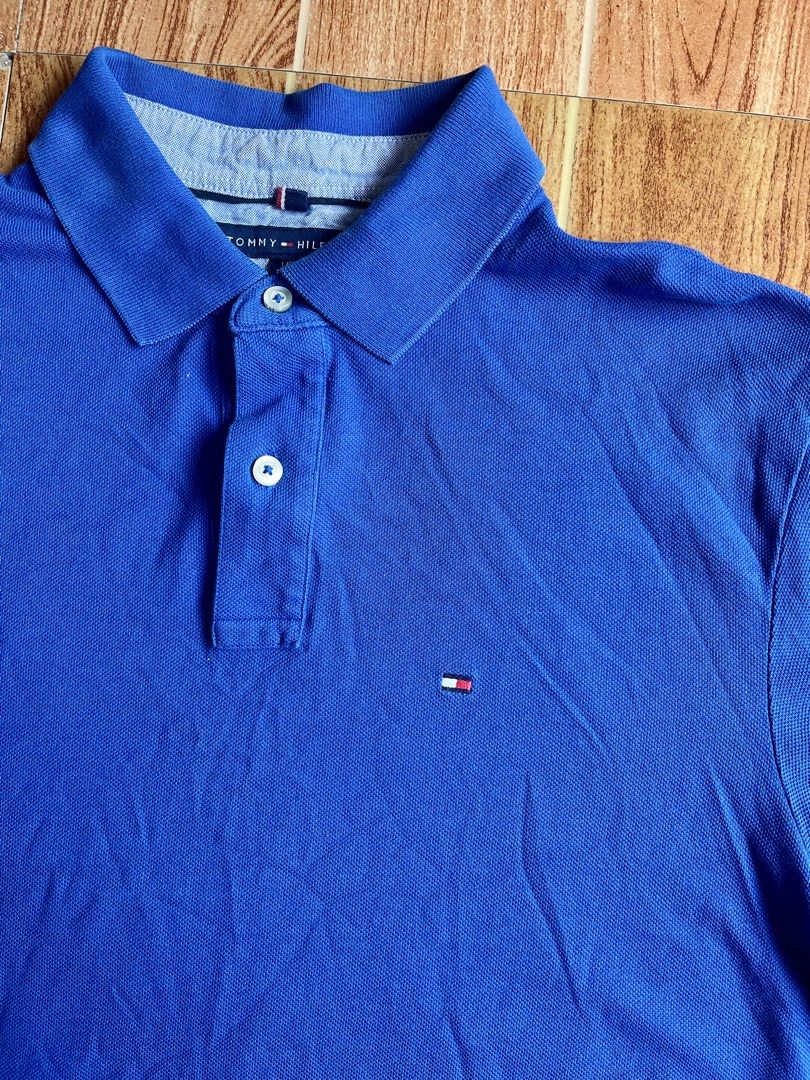 Tommy Hilfiger Polo Shirt (Category: Formal Shirts) located in Manila. Submitted by a.stmngo (Listing ID 1470425459, Image 2). Description: Size Large on tag Width 21 inches Length 29.5 inches Minimal dirt, lints needwash Good Condition 📍Manage your expectation. Item is thrifted. 📍Nagcarlan, Laguna.