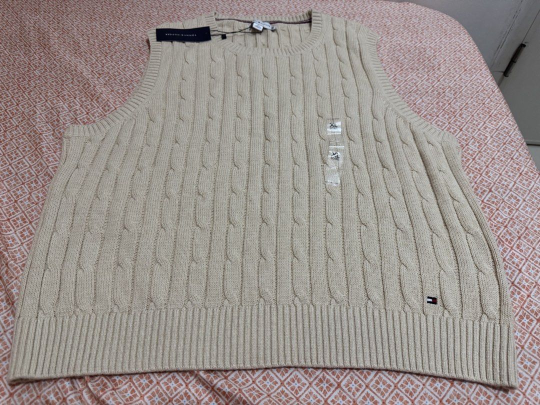 Tommy Hilfiger Sleeveless Knitted Blouse (Category: Announcements) located in Quezon City. Submitted by branded_jo (Listing ID 1470457252, Image 1). Description: Original Tommy Hilfiger Sleeveless Knitted Blouse Xl on tag Color Beige Brand new with tag Bought in Canada Lalamove Ready.