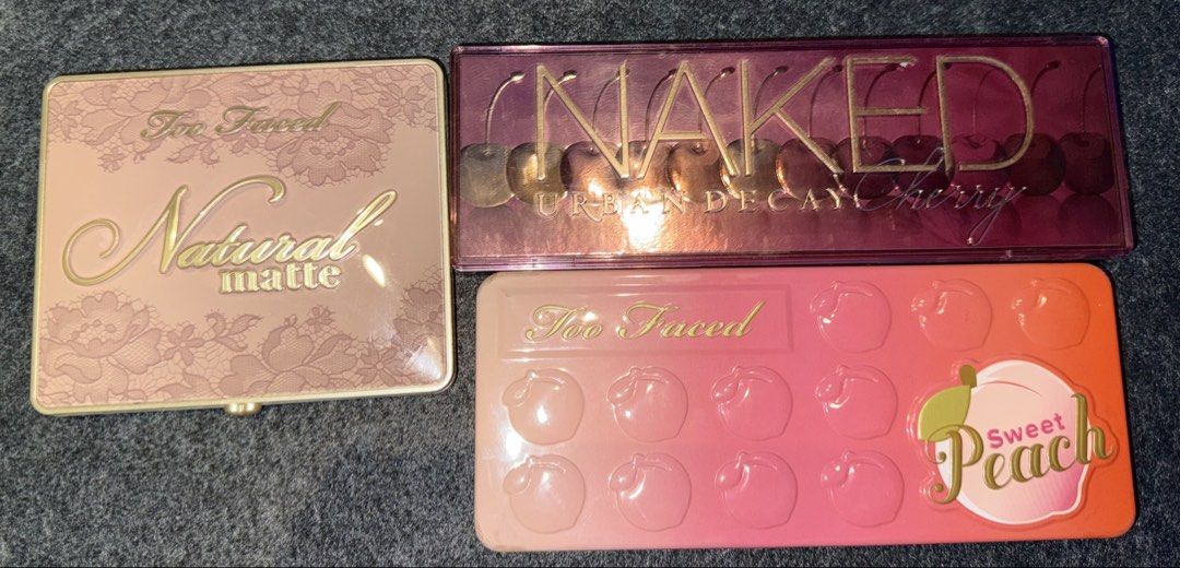 Authentic Too Faced and Urban Decay Eyeshadow Palettes Set (Category: Makeup) located in Manila. Submitted by grandpenguin0925 (Listing ID 1470554995, Image 1). Description: 100% AUTHENTIC bought from SEPHORA PH - Too Faced Natural Matte, Too Faced Sweet Peach, and Urban Decay Naked Cherry - Color story: A versatile mix of neutral mattes, warm pinks, and rich berry shades - Condition: Minor use on powders, pans are mostly full - Perfect for creat