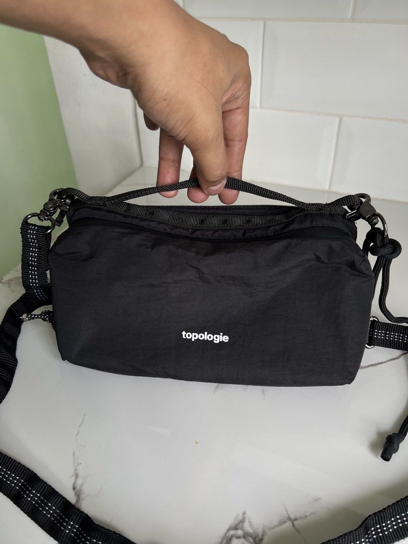 Topologie Bottle Sacoche Medium (Category: Belt bags, Clutches and Pouches) located in Cavite. Submitted by slumbermanila (Listing ID 1470500095, Image 2). Description: Topologie Bottle Sacoche Medium in good condition Note; Missing strap / Replaced lace strap.