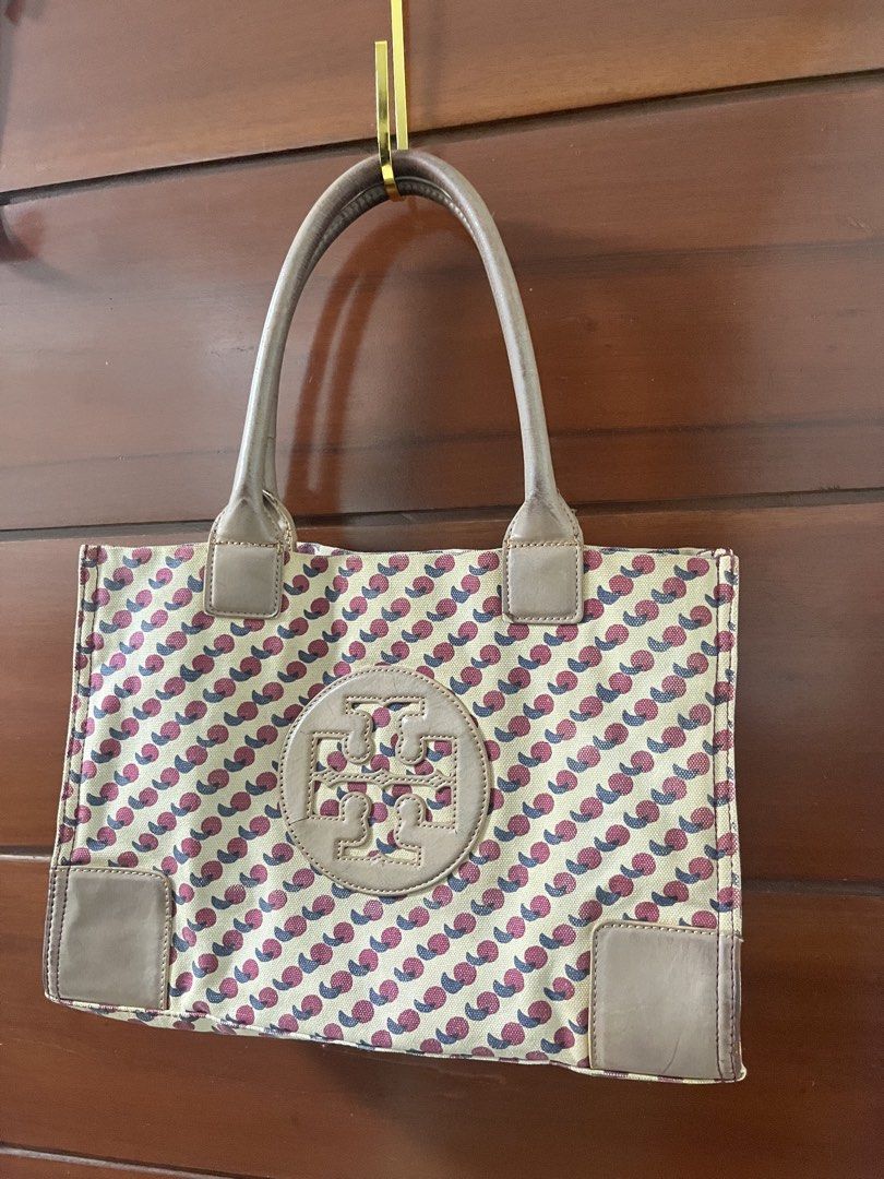 Tory burch cherry tote bag (Category: Tote Bags) located in Manila. Submitted by all.love.thrift.shop.v2 (Listing ID 1470486417, Image 1). Description: For sale Authentic tory burch tote bag Has signs of usage on leather and canvas Rank C 399 + sf As is, No return No exchange No refund Color may vary due to lighting All items are cleaned before shipping Payment first via gcash/maya/gotyme/maribank bank transfer 💰 Ship via LBC/J&T/Lalamove 🚛 📍 