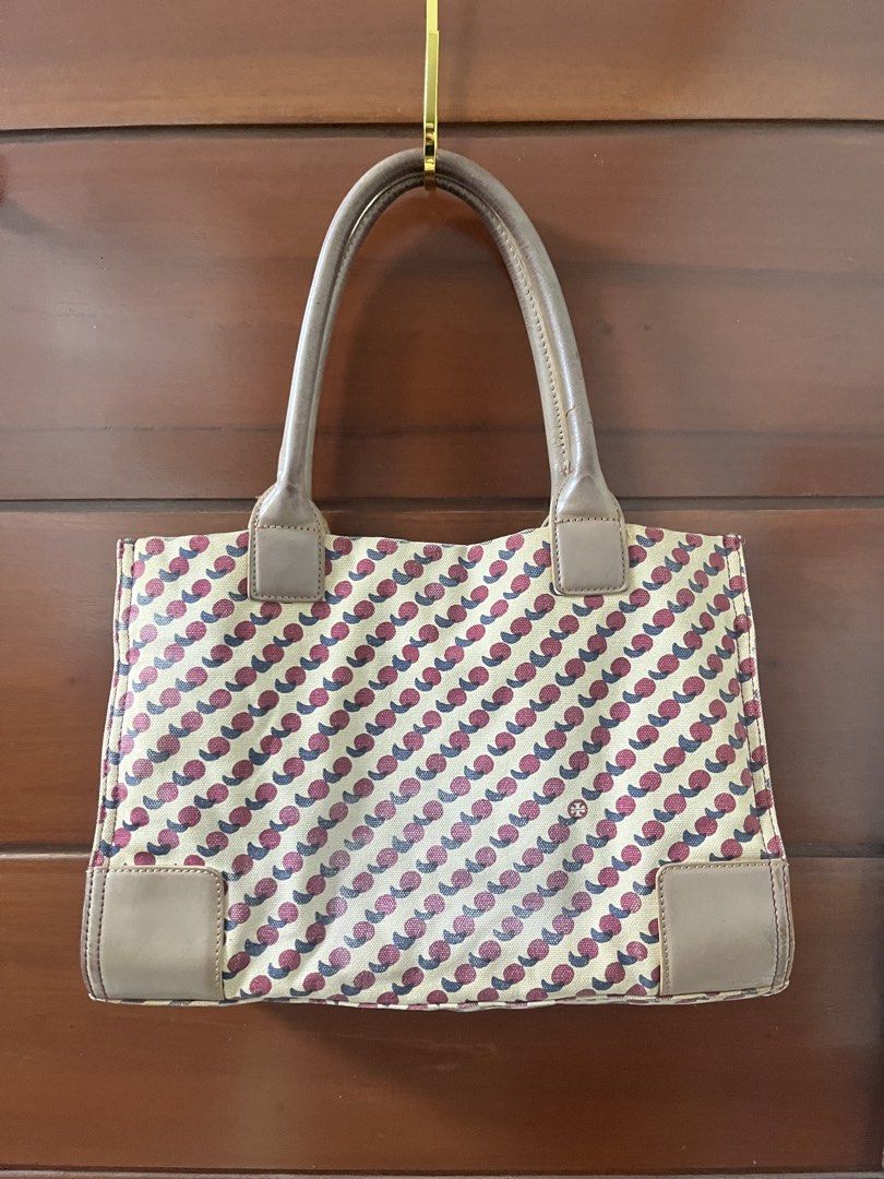 Tory burch cherry tote bag (Category: Tote Bags) located in Manila. Submitted by all.love.thrift.shop.v2 (Listing ID 1470486417, Image 3). Description: For sale Authentic tory burch tote bag Has signs of usage on leather and canvas Rank C 399 + sf As is, No return No exchange No refund Color may vary due to lighting All items are cleaned before shipping Payment first via gcash/maya/gotyme/maribank bank transfer 💰 Ship via LBC/J&T/Lalamove 🚛 📍 