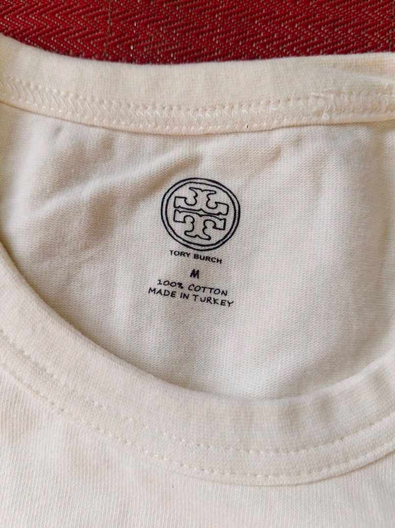 Tory Burch Crew neck Tshirt (Category: Tshirts & Polo Shirts ) located in Mabalacat. Submitted by zero2mthrift (Listing ID 1470422812, Image 2). Description: Excellent condition to As new No flaws Size Meduim on Tag 19.5 x 27 Complete tags and details Location: Pampanga.