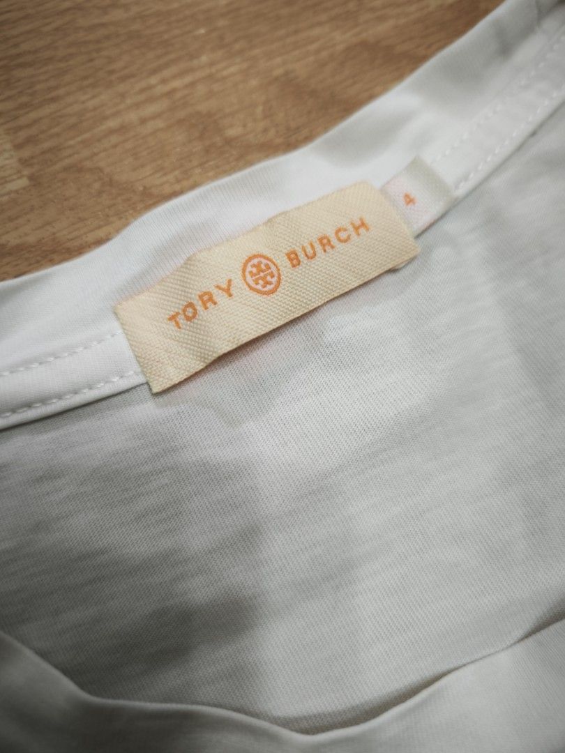 Tory Burch plain shirt (Category: Shirts) located in Manila. Submitted by wearforce (Listing ID 1470494234, Image 3). Description: Tory Burch plain shirt color: white fit: small color rate 9/10 in good condition 250 + sf.
