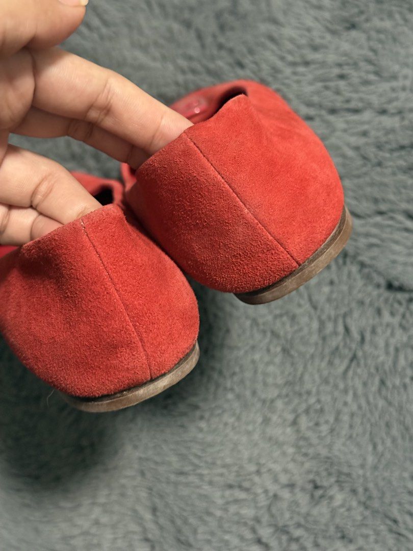 Tory Burch Red Suede Logo Flats Size 7M (Category: Flats & Sandals) located in Koronadal. Submitted by chaifinds (Listing ID 1470521030, Image 3). Description: Tory Burch Red suede flats with square toe and cutout logo plaque Size: 7M Material: Suede upper, leather lining and sole Condition: Suede upper still looks good overall; soles show normal signs of regular use Slip-on style for easy wear.