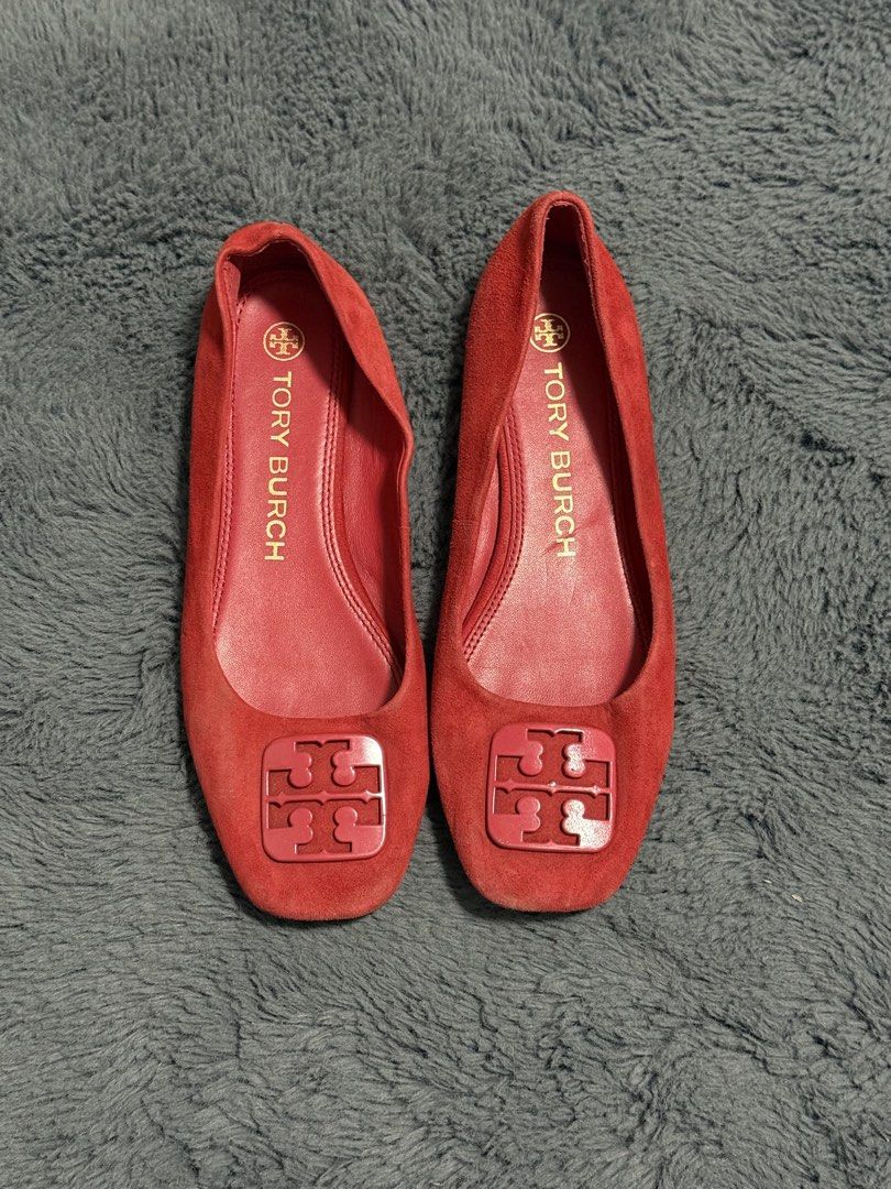 Tory Burch Red Suede Logo Flats Size 7M (Category: Flats & Sandals) located in Koronadal. Submitted by chaifinds (Listing ID 1470521030, Image 1). Description: Tory Burch Red suede flats with square toe and cutout logo plaque Size: 7M Material: Suede upper, leather lining and sole Condition: Suede upper still looks good overall; soles show normal signs of regular use Slip-on style for easy wear.