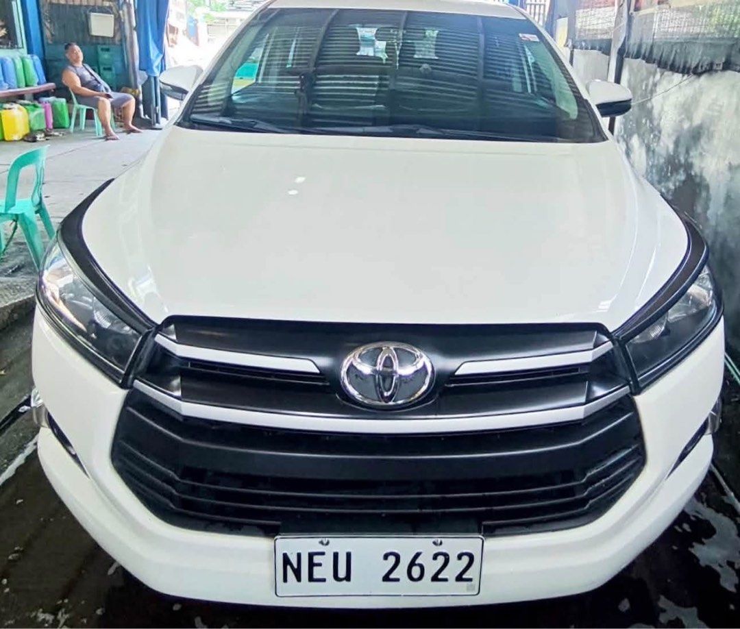 Toyota Innova (Category: Used Cars) located in Makati City. Submitted by kain44 (Listing ID 1470383323, Image 1). Description: ‼️FOR SALE:Toyota Innova J 2020 ‼️ Maayos na inalagaan at personal use.Owner moving abroad ✅ Toyota Innova J ✅ Manual Transmission ✅ Diesel Engine (Matipid sa krudo) ✅ White Pearl Color ✅ 200,000+ Odometer (Well-maintained) ✅Complete papers ready to transfer ✅Autosweep,Easytrip installed ✅ First Owner ✅ Good Running Condi