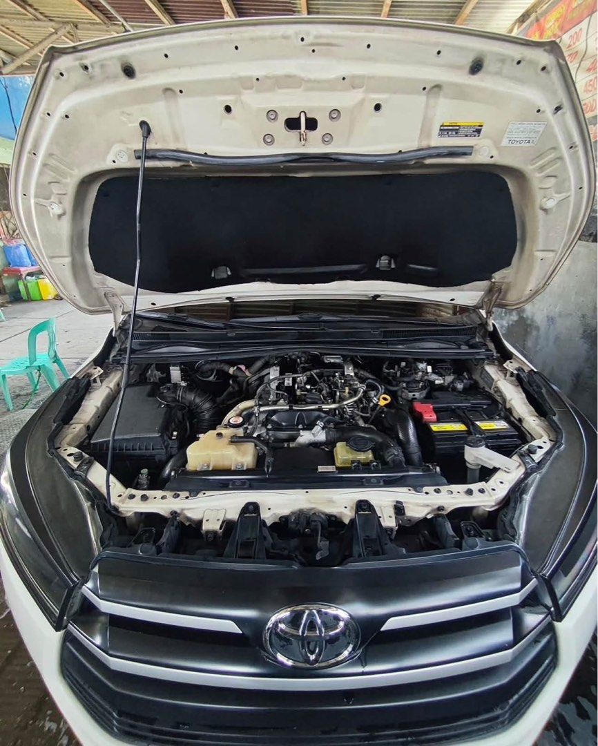 Toyota Innova (Category: Used Cars) located in Makati City. Submitted by kain44 (Listing ID 1470383323, Image 2). Description: ‼️FOR SALE:Toyota Innova J 2020 ‼️ Maayos na inalagaan at personal use.Owner moving abroad ✅ Toyota Innova J ✅ Manual Transmission ✅ Diesel Engine (Matipid sa krudo) ✅ White Pearl Color ✅ 200,000+ Odometer (Well-maintained) ✅Complete papers ready to transfer ✅Autosweep,Easytrip installed ✅ First Owner ✅ Good Running Condi