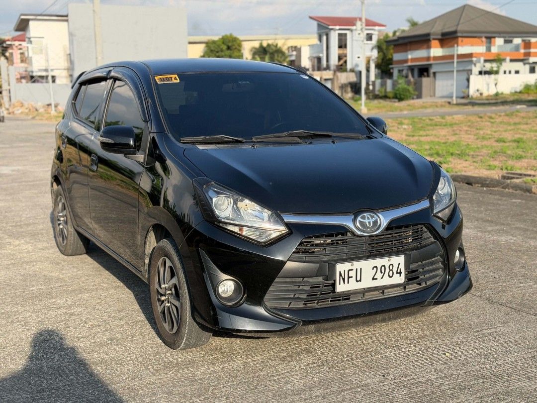 Toyota Wigo (Category: Used Cars) located in Manila. Submitted by agentruss (Listing ID 1470555572, Image 3). Description: 2019 Toyota Wigo G Automatic transmission Legit 1st owner acquired 72k original mileage 2pcs original keys Super fresh in and out Complete legal papers ready for transfer Original shiny paint 4pcs thick tires German leather seat installed Zero engine issue Solid underchasis Fuel efficient Gas and go! 358,000 only! Pm for loca