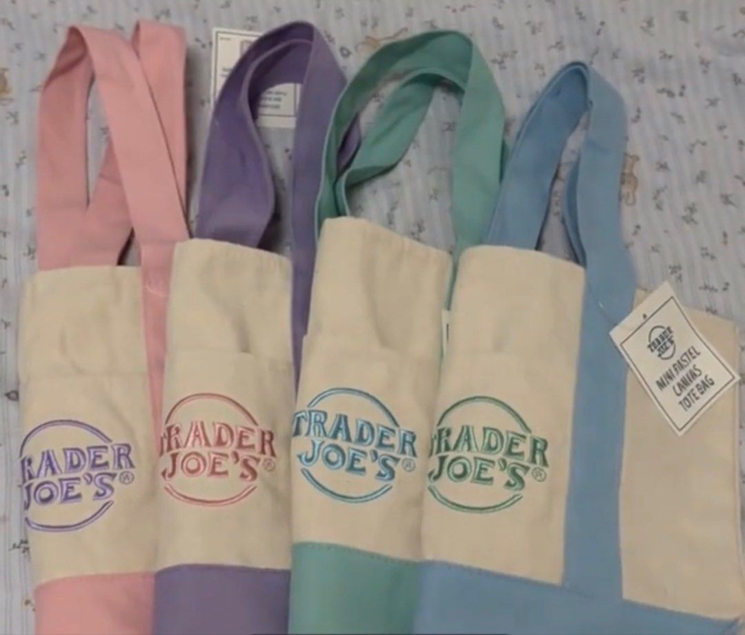 Trader Joe's Mini Pastel Canvas Tote Bag (Category: Tote Bags) located in Manila. Submitted by royalpengwen (Listing ID 1470440893, Image 1). Description: - 100% Authentic Trader Joe's Mini Pastel Canvas Tote Bag - Condition: Brand new with tags (BNWT) - Available colors: Pink, Purple, Mint Green, and Blue - Material: Durable, sturdy canvas with contrasting colored straps and bottom panel - Features: Convenient front slip pocket with embroidered 