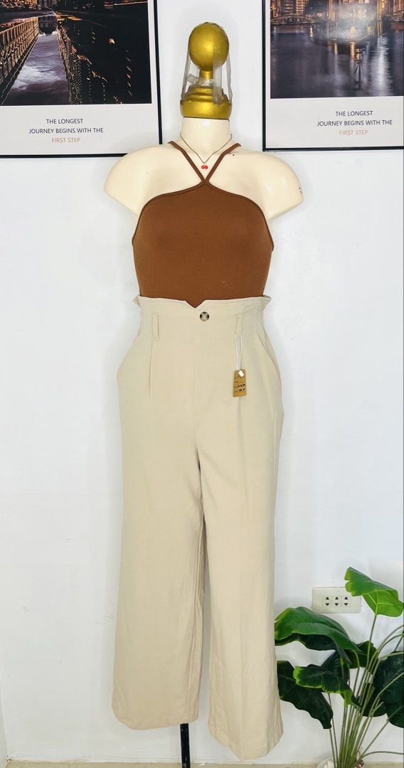 Trousers Pants | S: 26-31 (Category: Jeans) located in Manila. Submitted by bengirlclothing (Listing ID 1470487756, Image 2). Description: - Color: Versatile beige - Size: 26-31 inches - Length: 39 inches - Style: High-waist, wide leg with subtle front pleating - Perfect for casual days, office wear, or dressed-up occasions!.