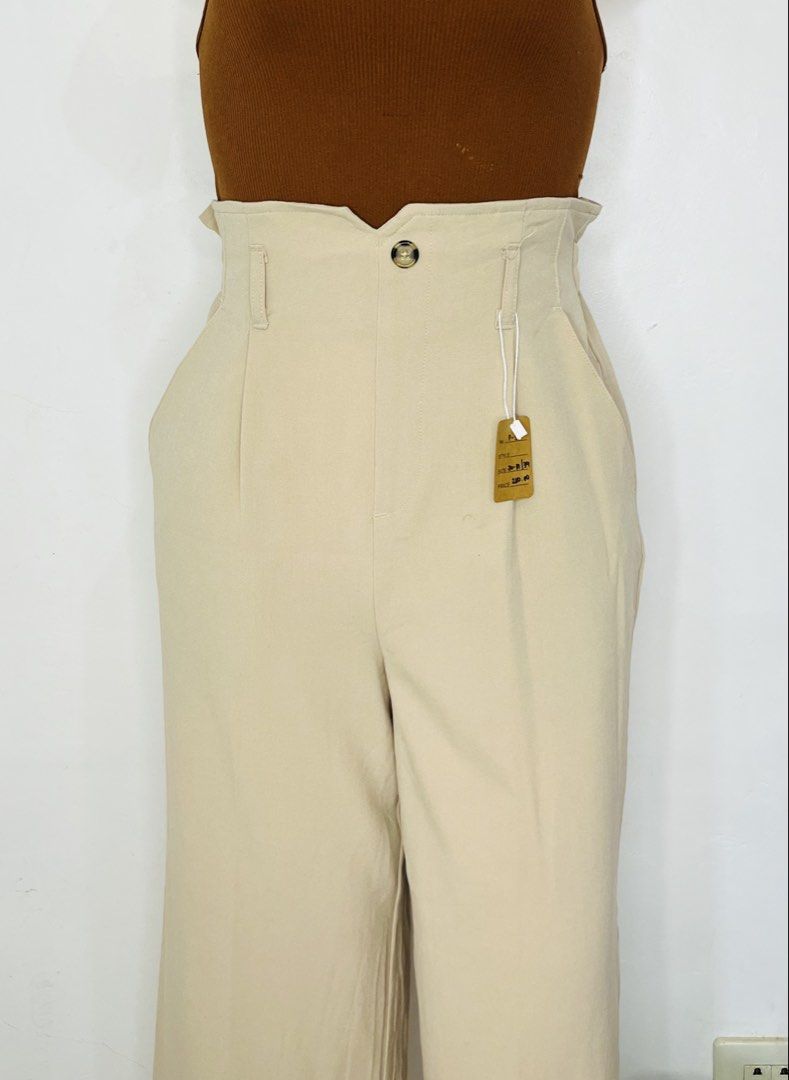 Trousers Pants | S: 26-31 (Category: Jeans) located in Manila. Submitted by bengirlclothing (Listing ID 1470487756, Image 3). Description: - Color: Versatile beige - Size: 26-31 inches - Length: 39 inches - Style: High-waist, wide leg with subtle front pleating - Perfect for casual days, office wear, or dressed-up occasions!.