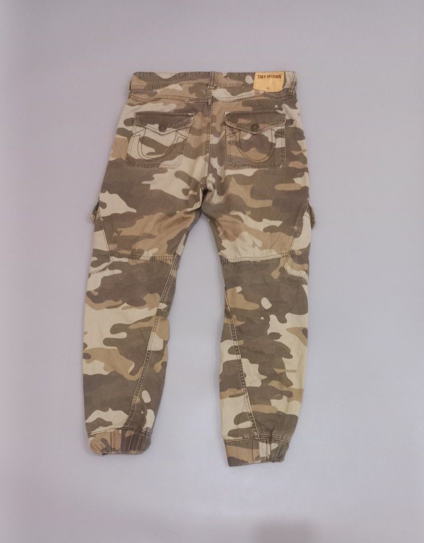 True Religion Camo Cargo Jogger Pants (Category: Joggers) located in Cebu City. Submitted by MrLiks_123 (Listing ID 1470496137, Image 1). Description: True Religion Men's Non Denim Camo joggers Cargo pants Size 33 ' 34 actual size Size 30 on tag Length 39½ Excellent condition Cebu Location Dm🙇.