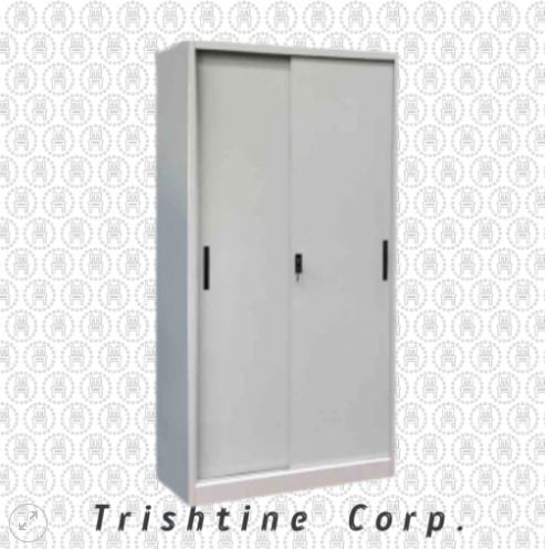 TSCAB-040A | Sliding Door Cabinet (Category: Shelves, Cabinets & Racks) located in Caloocan City. Submitted by jim.trishtineofficefurnitures (Listing ID 1470421301, Image 1). Description: - Brand: Trishtine Corp - Material: Strong, durable metal - Color: Light grey - Design: Space-saving sliding doors - Security: Built-in middle lock - Ideal for: Organizing office files and supplies DISCLAIMER: PRICE IS FOR POSTING PURPOSES ONLY.