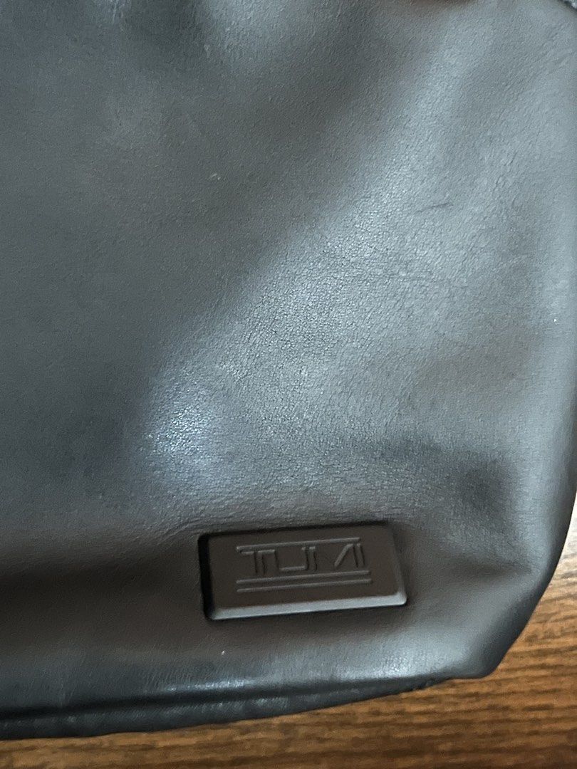 TUMI Tahoe Sling Bag (Category: Sling Bags) located in Victorias. Submitted by lan1877 (Listing ID 1470450334, Image 3). Description: - Authentic TUMI Tahoe sling bag in versatile black - Durable, high-quality material built for daily use - Adjustable shoulder strap with secure side release buckle - Secure zipper closures to keep items safe - Multiple compartments for easy organization of essentials - Interior lined with signature TUMI branding a