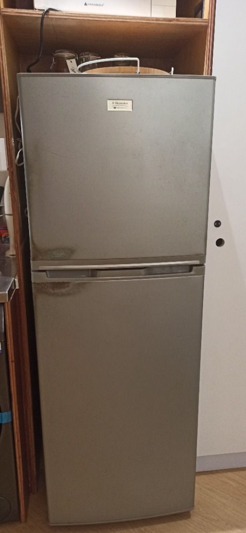 Two Door Small Refrigerator (Category: Refrigerators and Freezers) located in Manila. Submitted by peterp77 (Listing ID 1470402949, Image 2). Description: - Type: Two-door fridge with top freezer compartment - 224 L - Storage: Door shelves for drinks/cartons, egg tray, and bottom crisper drawer - Shelves: Removable glass shelves for flexible organization - Condition: Clean interior, all bins intact, and 100% working - Ideal For: Small apartments,