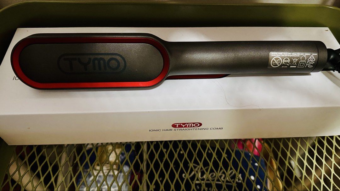 TYMO Ring Plus Ionic Hair Straightening Comb (Category: Hair) located in Mandaluyong City. Submitted by onetraveler76 (Listing ID 1470443172, Image 1). Description: - Brand: TYMO Ionic Hair Straightening Comb - Fast Heat-Up: Quick styling for busy mornings - Frizz Control: Easily smooths out frizz for a sleek finish - Ergonomic Design: Compact handle with an easy grip - Ideal for daily use and effortless hair routines Almost brandnew. Used it twi