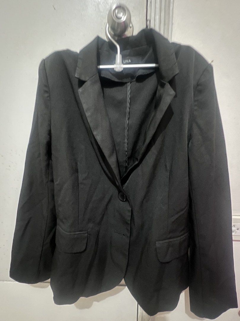 UNA Black Blazer Size L (Category: Coats, Jackets and Outerwear) located in Manila. Submitted by reyctennis (Listing ID 1470399226, Image 2). Description: - Brand: UNA - Size: Large (True to size) - Color: Classic Black - Closure: Single-button front - Pockets: Two functional flap pockets - Style: Structured lapel collar, long sleeves, clean lines - Versatile: Ideal for workwear or elevating casual outfits.