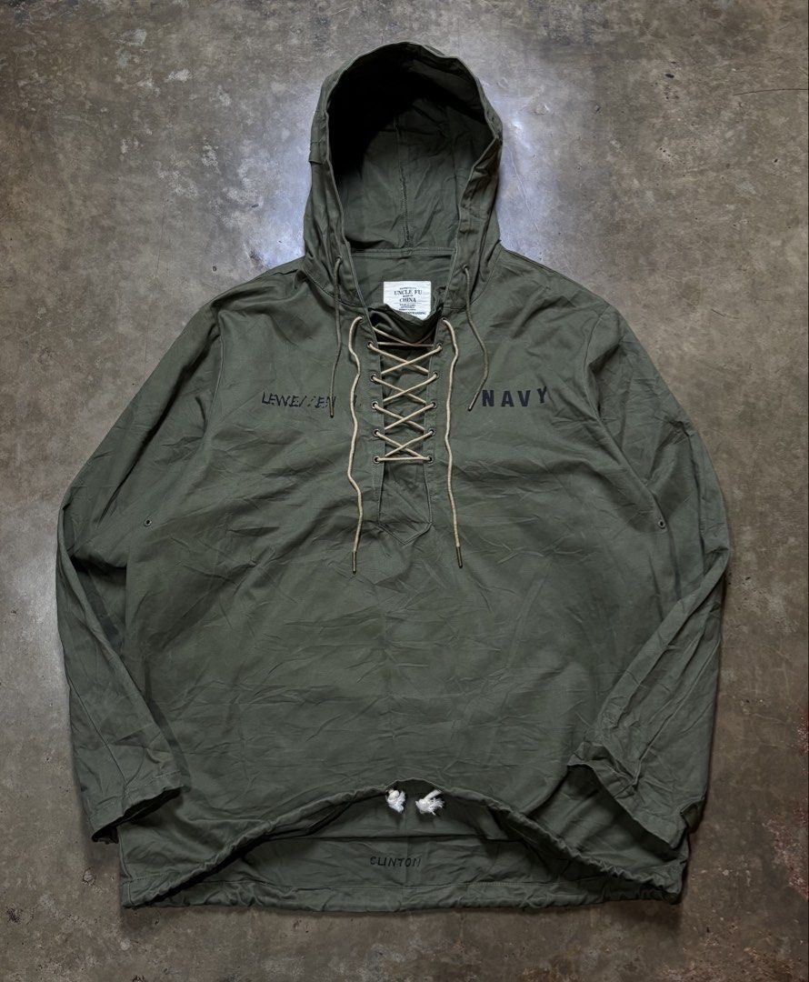 Uncle Fu Maden - US Navy Deck Jacket (Category: Coats, Jackets and Outerwear) located in Dipolog. Submitted by krstnagnis98 (Listing ID 1470486512, Image 2). Description: Uncle Fu x Maden Military USN Wet Weather Pullover Anorak Jacket. This piece is a vintage-inspired reproduction modeled after the iconic U.S. Navy Foul Weather/Gunner Smocks worn by sailors during World War II. It features a distinctive lace-up placket neckline, an oversized adj