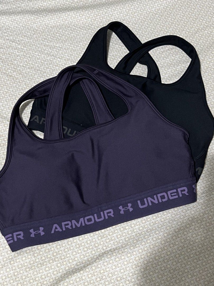 Under Armour Compression Sports Bras Bundle Black Purple Medium (Category: Activewear) located in Marikina City. Submitted by tintinarenas (Listing ID 1470452399, Image 1). Description: - Brand: Under Armour - Quantity: Bundle of 2 sports bras - Colors: Black and Dark Purple - Size: Medium (M) - Design: Racerback with supportive straps and branded elastic band - Material: Breathable, ideal for workouts - Origin: Made in Vietnam.