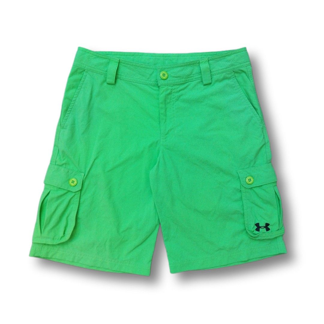 Under Armour Neon Cargo Shorts (Size 29) (Category: Shorts) located in Cavite. Submitted by spinfits (Listing ID 1470425734, Image 1). Description: - Brand: Under Armour - Material: Lightweight ripstop fabric with mesh-lined waist - Closure: Button fly with belt loops - Pockets: 2 front pockets and 2 buttoned side cargo pockets - Details: Black Under Armour logo on the right pocket flap Size (INCHES) Waist: 29 length: 18.5 Thigh: 12 Leg opening: 