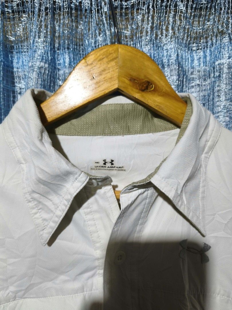 Under Armour Tactical Polo (Category: Formal Shirts) located in Tayug. Submitted by pabilidamitngpatay (Listing ID 1470525726, Image 3). Description: Under Armour Tactical Polo 22/29 lightweight/breathable fabric as new condition no flaws.