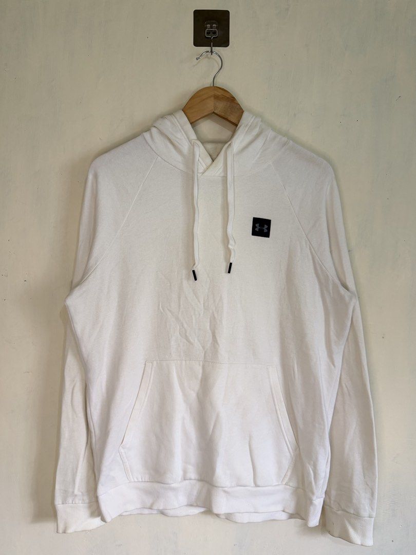 Under Armour White Hoodie Size Medium (Category: Hoodies) located in Manila. Submitted by snipe.shit (Listing ID 1470423970, Image 1). Description: - Brand: Under Armour - Color: White - Size: Medium (True to size) - Material: 80% cotton, 20% polyester (100% cotton hood lining) - Details: Box logo patch on left chest, adjustable drawstring hood, front kangaroo pocket - Origin: Made in Philippines - Condition: Clean, minimal streetwear staple for 