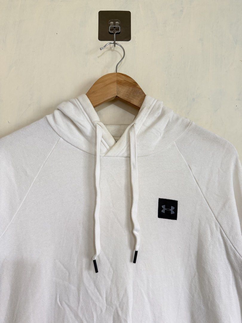 Under Armour White Hoodie Size Medium (Category: Hoodies) located in Manila. Submitted by snipe.shit (Listing ID 1470423970, Image 2). Description: - Brand: Under Armour - Color: White - Size: Medium (True to size) - Material: 80% cotton, 20% polyester (100% cotton hood lining) - Details: Box logo patch on left chest, adjustable drawstring hood, front kangaroo pocket - Origin: Made in Philippines - Condition: Clean, minimal streetwear staple for 