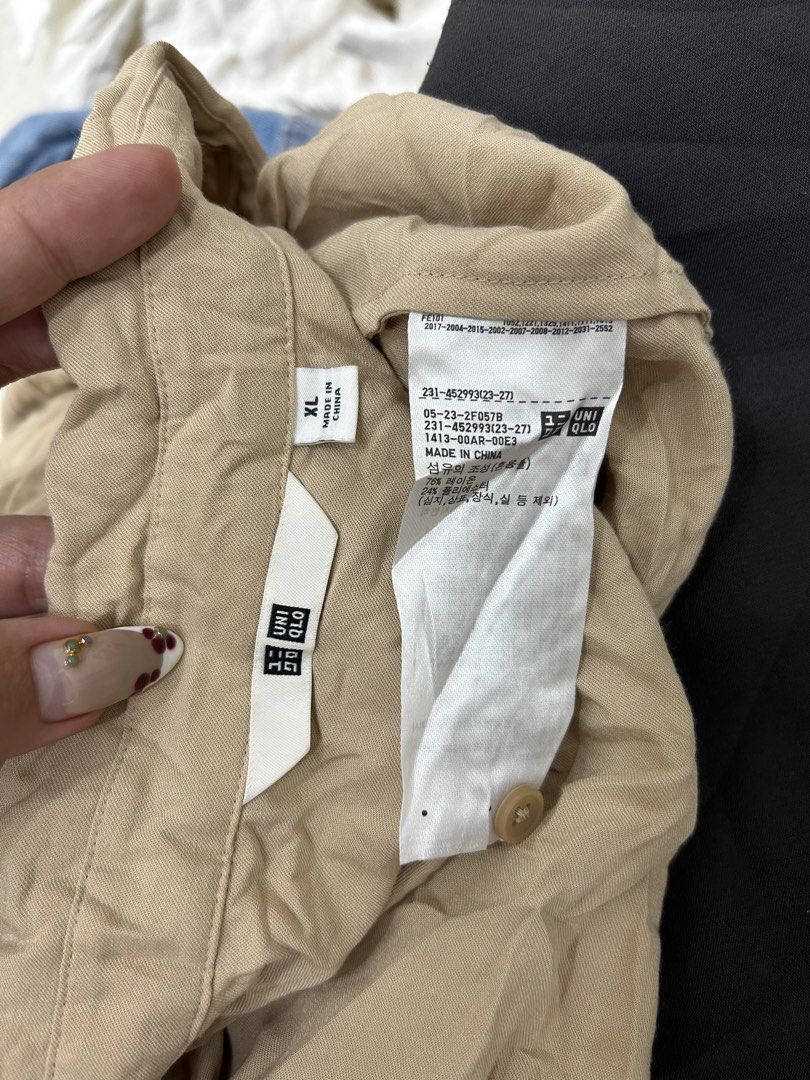 Uniqlo Beige Blouse XL (Category: Blouses) located in Valencia. Submitted by crizzagella20 (Listing ID 1470545802, Image 2). Description: - Brand/Model: Uniqlo Button-Down Blouse - Color: Classic Beige - Size: XL (Relaxed Fit) - Material: 76% Rayon, 24% Polyester (Lightweight & Comfortable) - Features: Collared neckline, long sleeves - Versatility: Perfect for office wear or casual outings, easy to pair with pants or skirts.