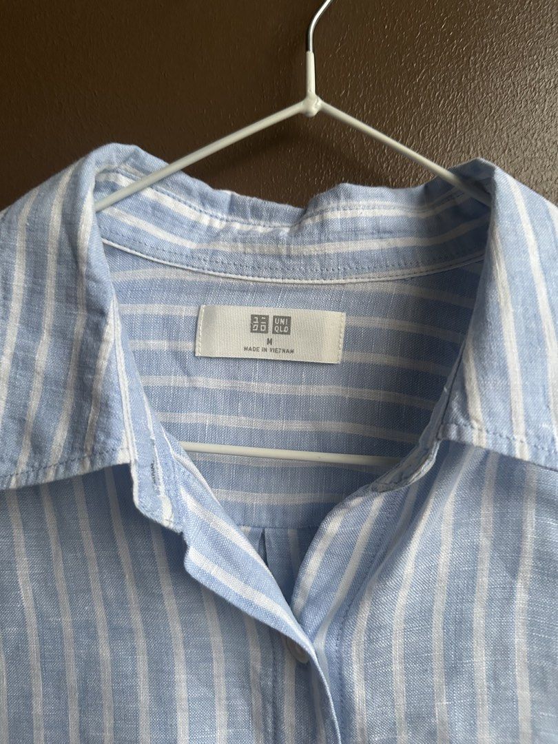 Uniqlo blue and white striped longsleeve button-down (Category: Longsleeves) located in Pasig City. Submitted by afterglowpreloved (Listing ID 1470463334, Image 2). Description: .