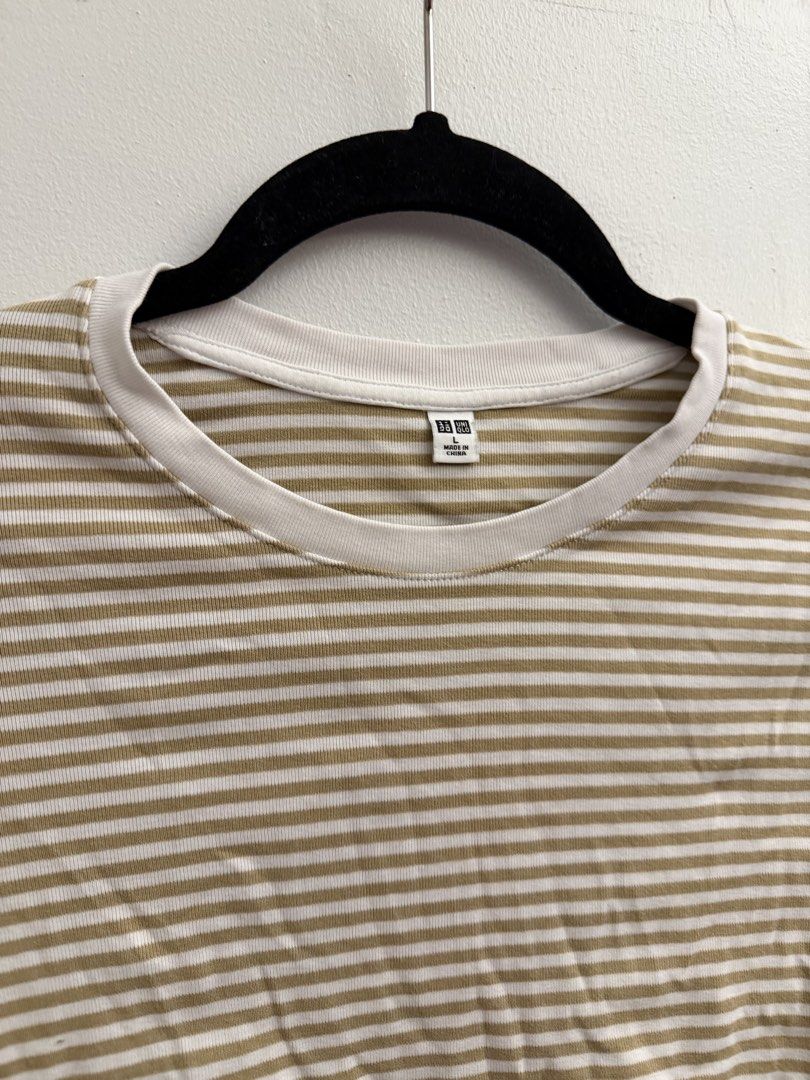 UNIQLO Stripes Baby tee (Category: Shirts) located in Manila. Submitted by closetclearout.mnl (Listing ID 1470401862, Image 2). Description: Shrunk in the dryer size: small - medium best fit: medium .