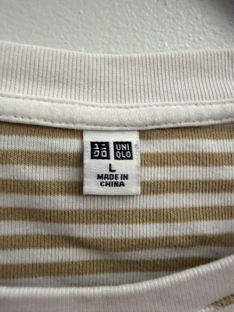 UNIQLO Stripes Baby tee (Category: Shirts) located in Manila. Submitted by closetclearout.mnl (Listing ID 1470401862, Image 1). Description: Shrunk in the dryer size: small - medium best fit: medium .