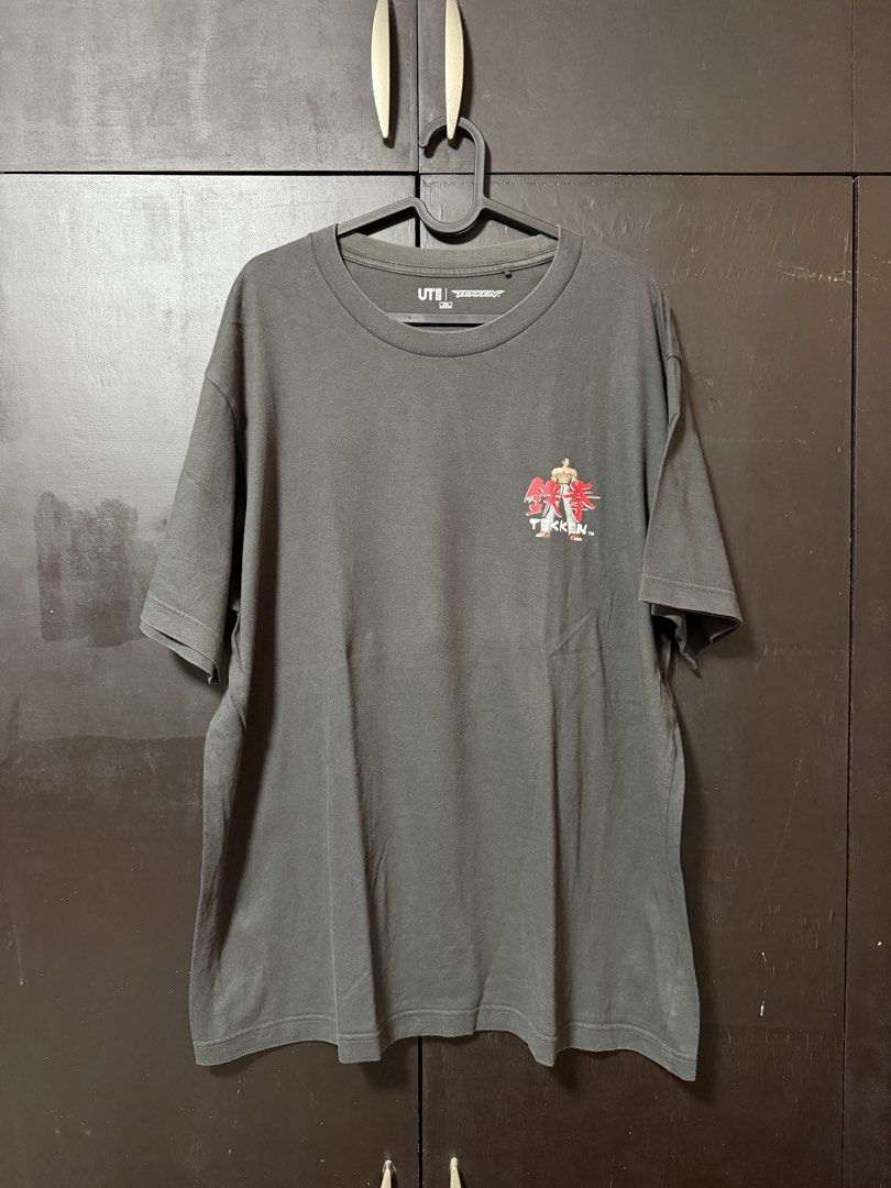 Uniqlo Tekken Tee (Category: Tshirts & Polo Shirts ) located in Antipolo. Submitted by yeoni19 (Listing ID 1470420256, Image 1). Description: Uniqlo Tekken Tee 300 +sf 24x29.5 Signs of usage, Fading Color may vary due to lighting. Feel free to message if you have any questions..