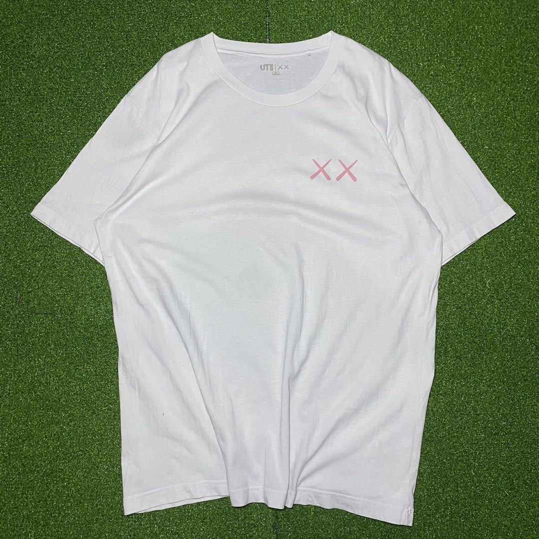 UNIQLO X KAWS (Category: Activewear) located in Zaragoza. Submitted by 9701026734 (Listing ID 1470506528, Image 2). Description: UNIQLO KAWS ‎ size XL ‎dimes W23/L30 ‎condition EXCELLENT ‎color rate 9.8/10 ‎issue NONE.