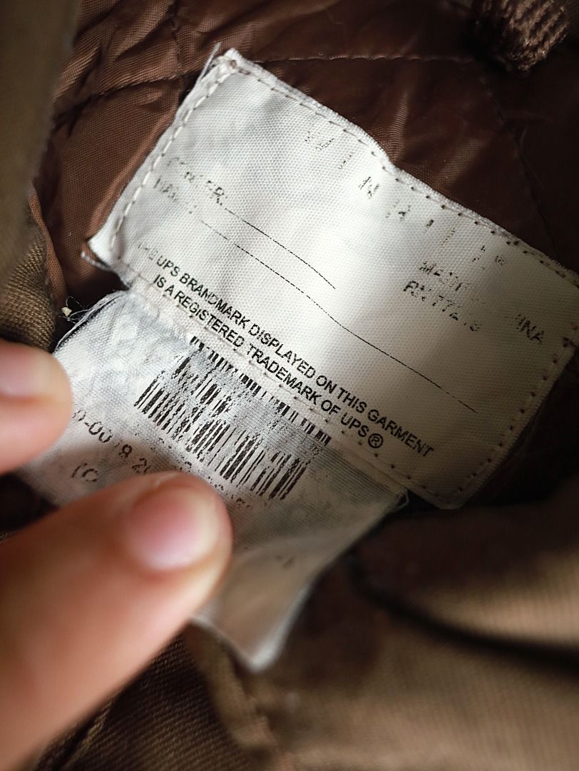 UPS Authorized Half-Zip Workwear Jacket (Category: Coats, Jackets and Outerwear) located in Pasig City. Submitted by mlclmchrs (Listing ID 1470440943, Image 3). Description: Sizing: XL - 2xl (Boxy fit) Width - 27 inches Length - 26 inches Sleeve length - 18 inches Issues: small damages on reflectorized strip.