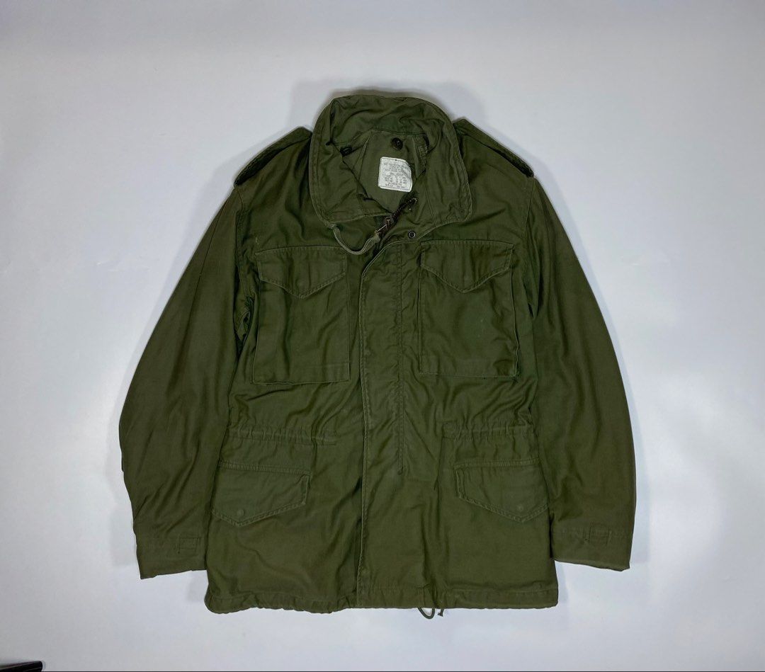 US Army M65 Field Jacket (Category: Coats, Jackets and Outerwear) located in Bago City. Submitted by johnpaul_gidlayan (Listing ID 1470404319, Image 2). Description: US Army M-65 Field Jacket Classic OG107 Olive Green Item Details Size: Small-Regular Dimension: 21x30 Sleeves: 24 Shoulder: 19.5 Condition: Verygood condition (needwash) Color Rate: 9.2/10 Flaws: Sign of usage Dirt & Slightly Discoloration (check details) (Item color vary due to ligh