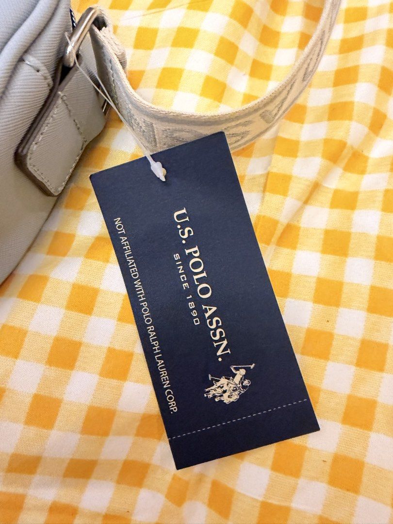 U.S. Polo Assn. Crossbody Bag (Category: Cross-body Bags) located in Malolos. Submitted by bg.brnrdo (Listing ID 1470463597, Image 2). Description: - Light blue (slate blue) U.S. Polo Assn. Classic Zip Crossbody Bag - Webbed logo strap and a silver-tone polo player emblem - Bought in the US with original tag :) RFS: Decluttering 📍Location: Malolos City, Bulacan 💳 MOP: Gcash/Maribank/Maya 📦 MOD: Lalamove/Grab Express/J&T Payment first. SF is sh