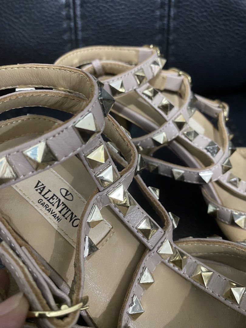 Valentino Garavani Rockstud Kitten Heel Pumps (Category: Sneakers & Footwear) located in Antipolo. Submitted by switchneighborhood (Listing ID 1470456838, Image 2). Description: - Brand: Valentino Garavani - Style: Rockstud Kitten Heel Pumps - Color: Classic Neutral Beige - Material: Premium Patent Leather - Details: Signature gold-tone pyramid stud hardware, caged trim, and multiple adjustable ankle straps - Toe Shape: Pointed toe - Condition: E
