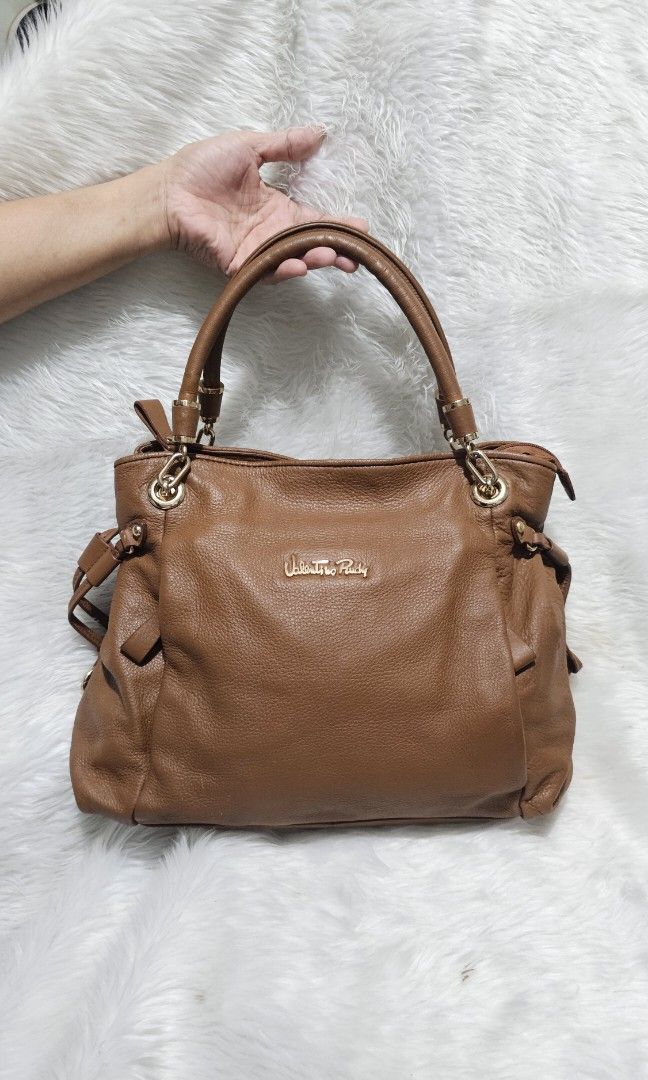 VALENTINO RUDY SHOULDER BAG (Category: Shoulder Bags) located in Bulacan. Submitted by misyeljane (Listing ID 1470421760, Image 1). Description: PRELOVED VALENTINO RUDY SHOULDER BAG MEDIUM SIZE PEBBLED GENUINE SOFT LEATHER MAY 2 POCKET SA HARAP MAY ADJUSTABLE SA MAGKABILANG GILID COMPLETE YUNG PAA SA ILALIM NAKA ENGRAVE BRAND SA MGA HARDWARE MINIMAL SIGN OF USE (SCRATCHES)DI HALATA PM FOR MORE INFO.
