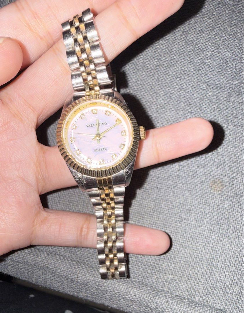 Valentino Two-Tone Quartz Watch Model 3230 (Category: Women's Watches) located in Manila. Submitted by rare.desteen (Listing ID 1470375888, Image 3). Description: - Brand/Model: Valentino Quartz Wristwatch (Model 3230) - Design: Two-tone stainless steel bracelet with luxurious gold-plated bezel, crown accents, and fluted bezel details - Dial: Round dial featuring elegant rhinestone hour markers - Movement: Reliable Japanese quartz movement - Buil