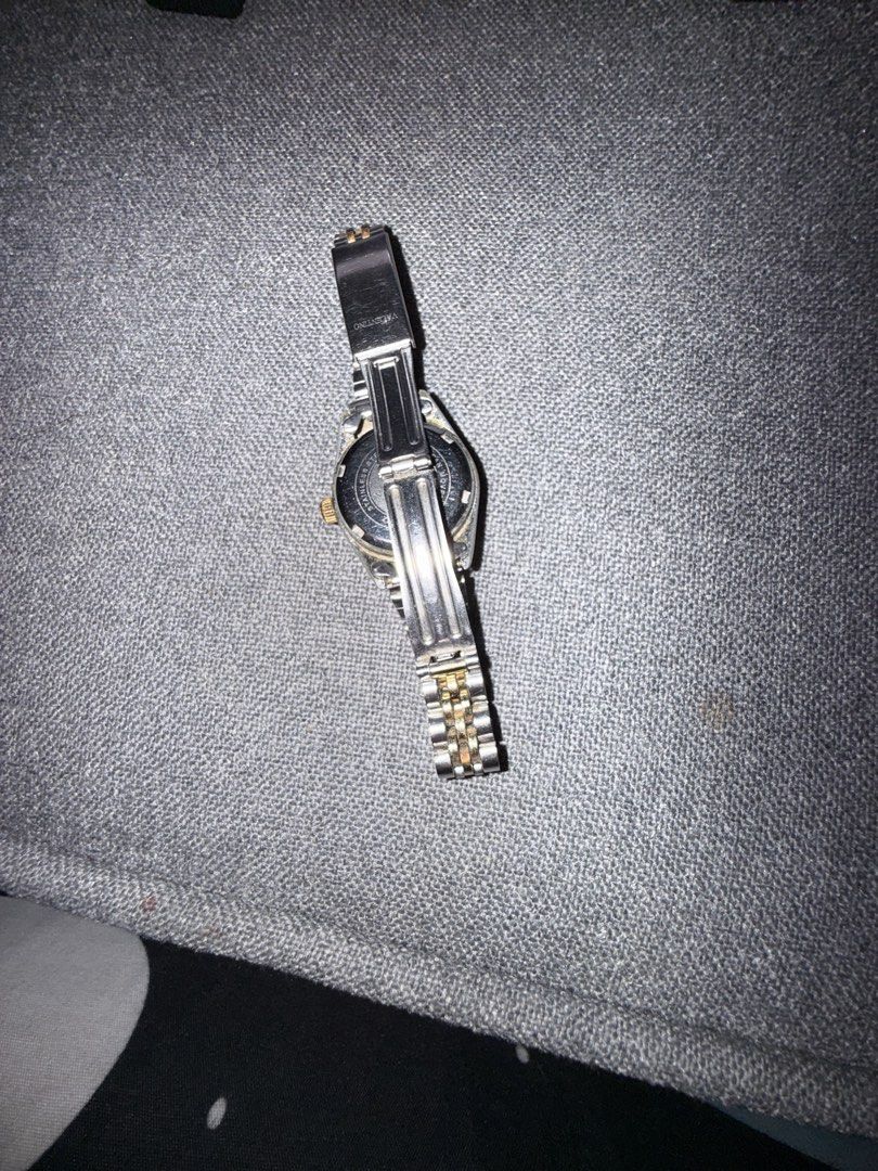 Valentino Two-Tone Quartz Watch Model 3230 (Category: Women's Watches) located in Manila. Submitted by rare.desteen (Listing ID 1470375888, Image 2). Description: - Brand/Model: Valentino Quartz Wristwatch (Model 3230) - Design: Two-tone stainless steel bracelet with luxurious gold-plated bezel, crown accents, and fluted bezel details - Dial: Round dial featuring elegant rhinestone hour markers - Movement: Reliable Japanese quartz movement - Buil