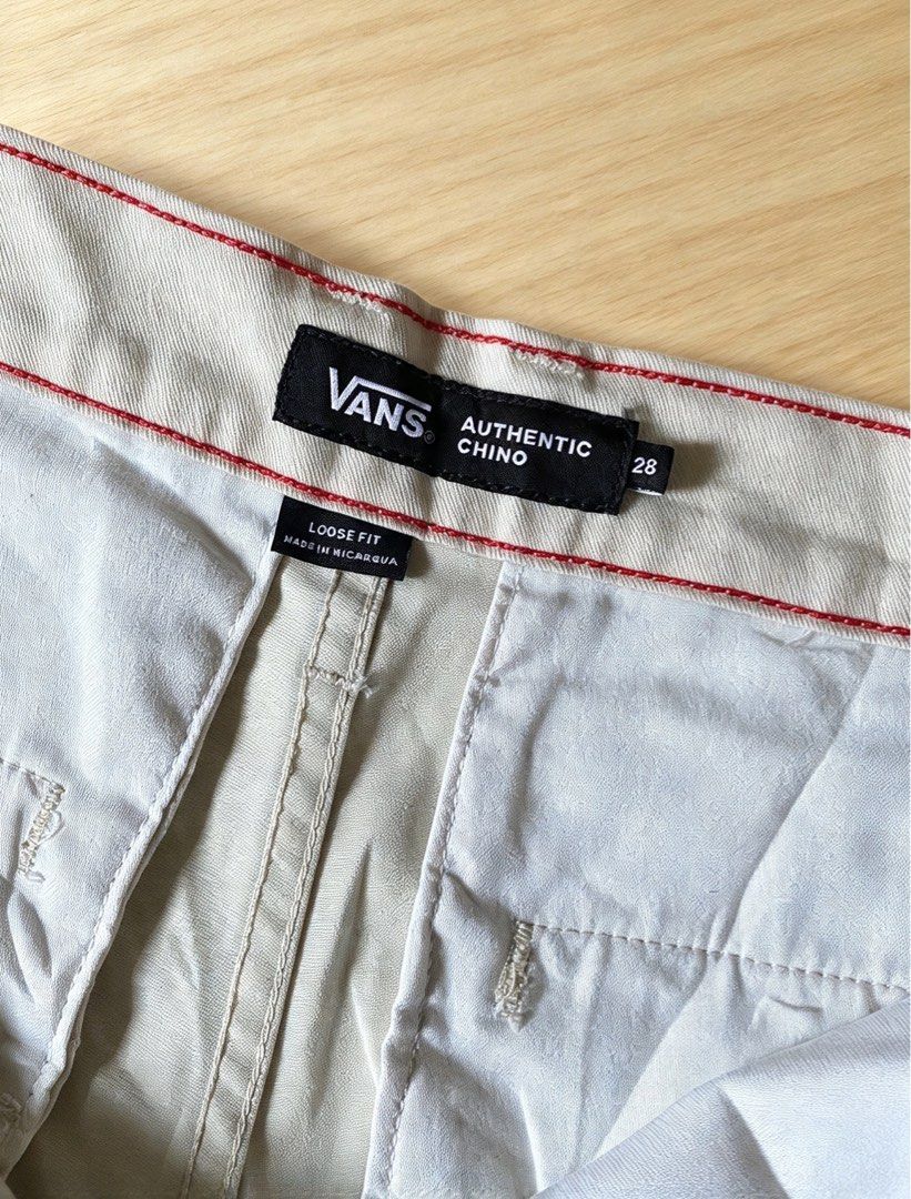 Vans Authentic Chino Loose Fit Pants (Category: Chinos) located in Manila. Submitted by tygaangub1096 (Listing ID 1470359129, Image 3). Description: - Brand: Vans - Style: Authentic Chino Trousers (Loose Fit) - Color: Light Beige - Size: 28 waist 41 length 8 hem - Closure: Classic button and zip fly - Pockets: Two front pockets and two rear buttoned welt pockets - Details: Signature Vans woven labels near the front pocket and back right pocket, w