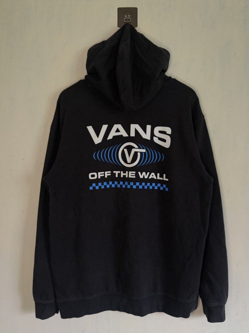 Vans Off The Wall Black Pullover Hoodie Size L (Category: Hoodies) located in Manila. Submitted by snipe.shit (Listing ID 1470422482, Image 3). Description: - Brand: Vans - Color: Black - Size: Large - Design: Classic 'Off The Wall' graphic on chest and back with blue soundwave and checkerboard details - Features: Drawstring hood and front kangaroo pocket - Material: Cotton and polyester blend - Origin: Made in Guatemala - Condition: Excellent pr